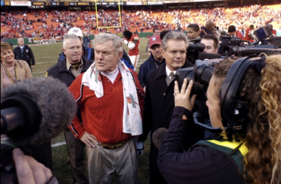 Kansas City Chiefs head coach Dick Vermeil was surrounded by the press after the last game of his coaching career against the Cincinnati Bengals at Arrowhead Stadium in Kansas City, MO.