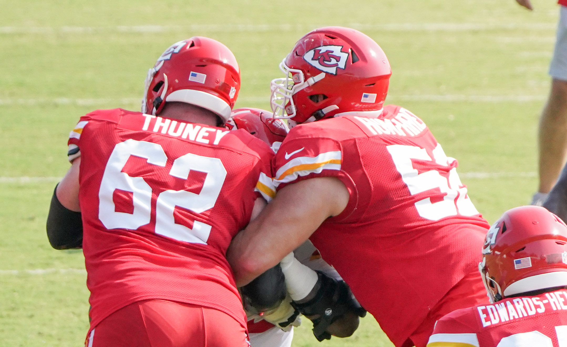 Joe Thuney (62) and center Creed Humphrey (52) block during training camp at Missouri Western State University. 