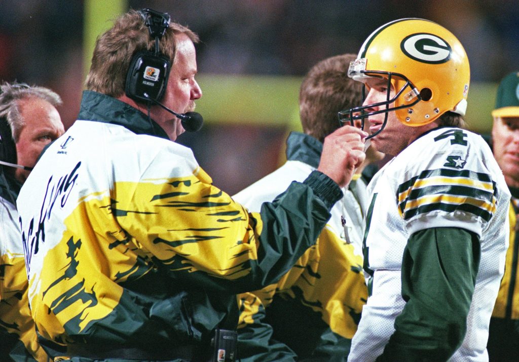 Doug Pederson's coach, Mike Holmgren, talking to Brett Favre