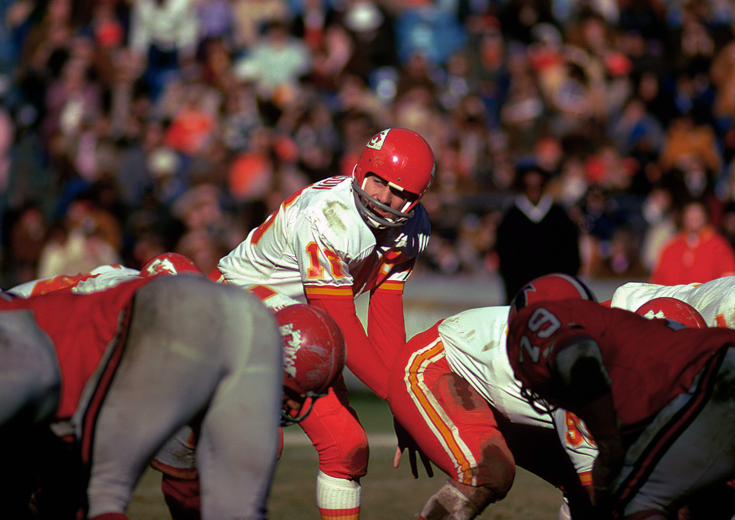 Len Dawson takes a snap from under center