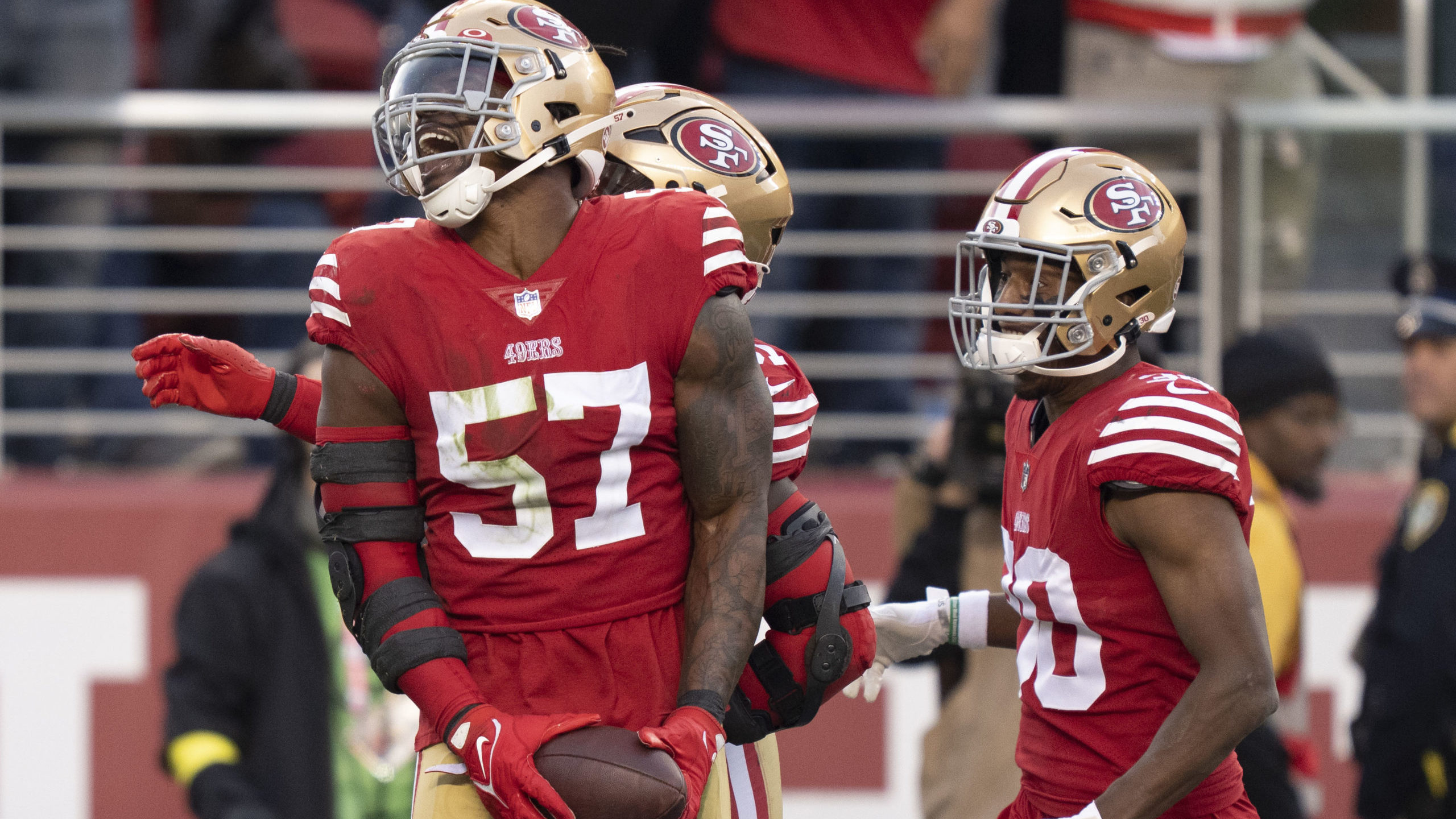 49ers defense celebrate vs. Saints