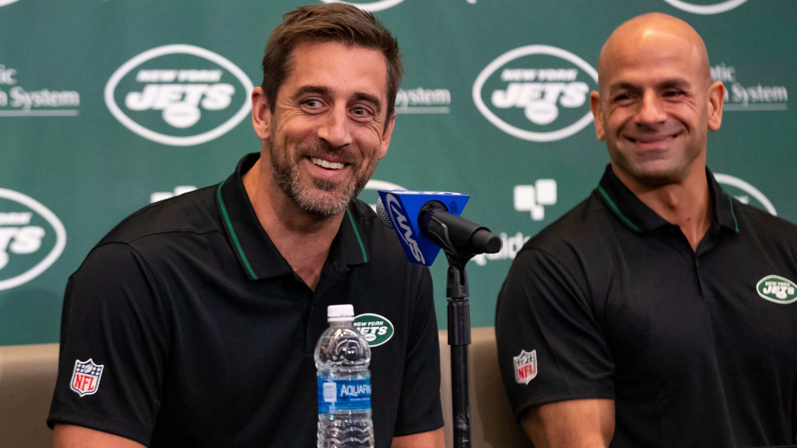 Aaron Rodgers and Robert Saleh