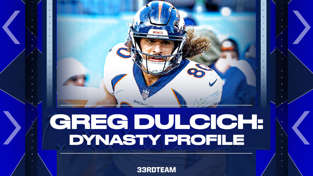 Graphic featuring a close-up of Denver Broncos tight end in a white jersey and the text "Greg Dulcich Dynasty Profile, 33rd Team" in front of a purple and black background