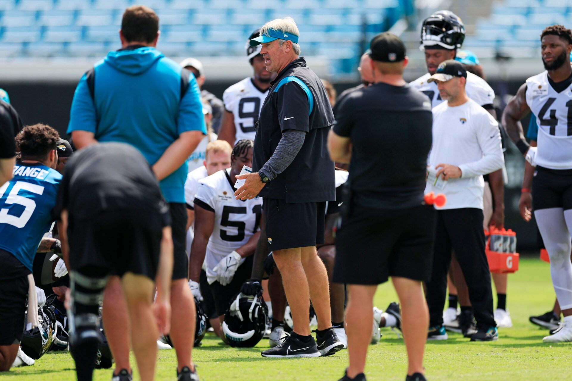 Jacksonville Jaguars head coach Doug Pederson talks to players