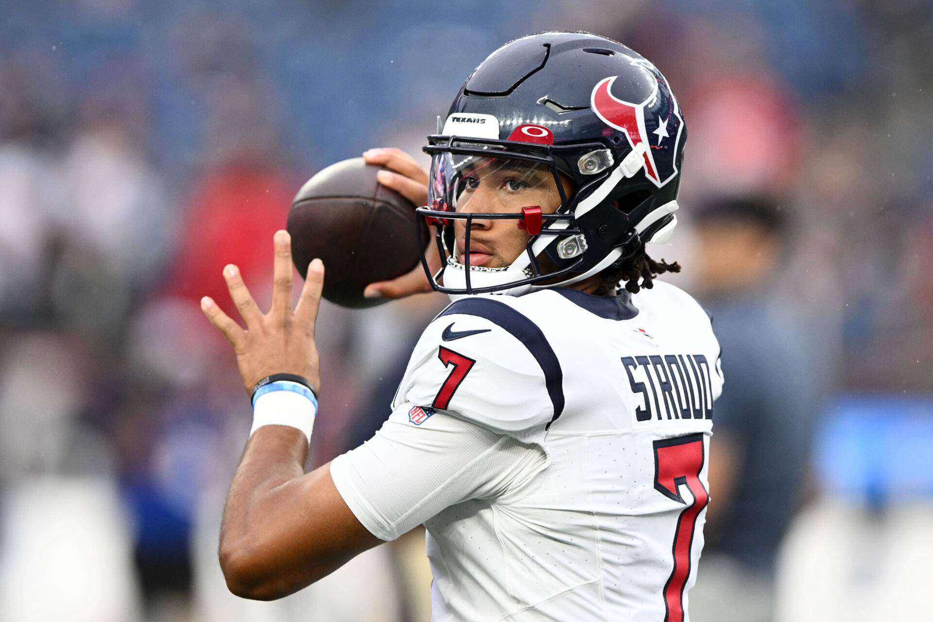 A close-up image of C.J. Stroud throwing the football