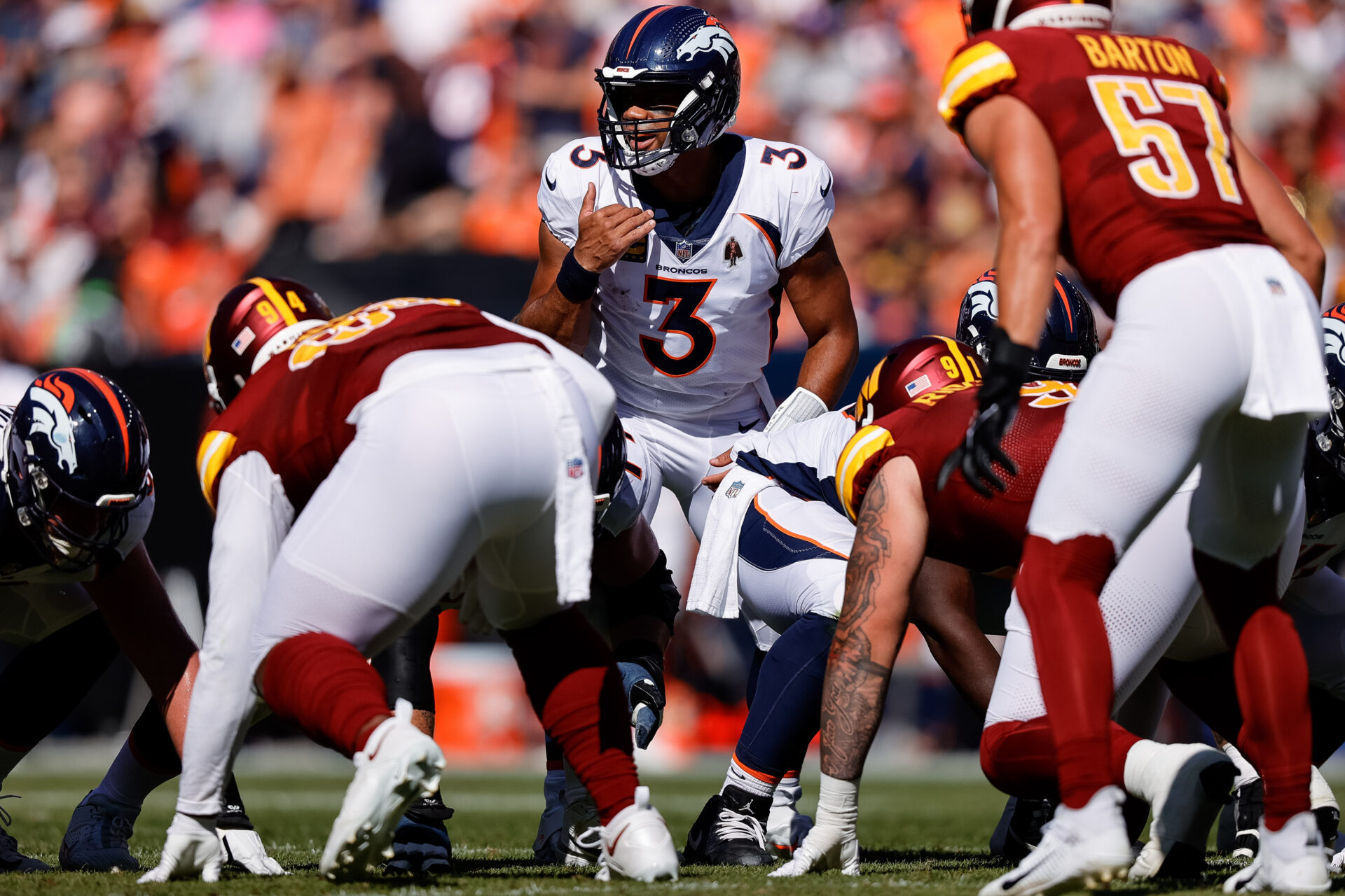 Russell Wilson behind the Denver Broncos line of scrimmage