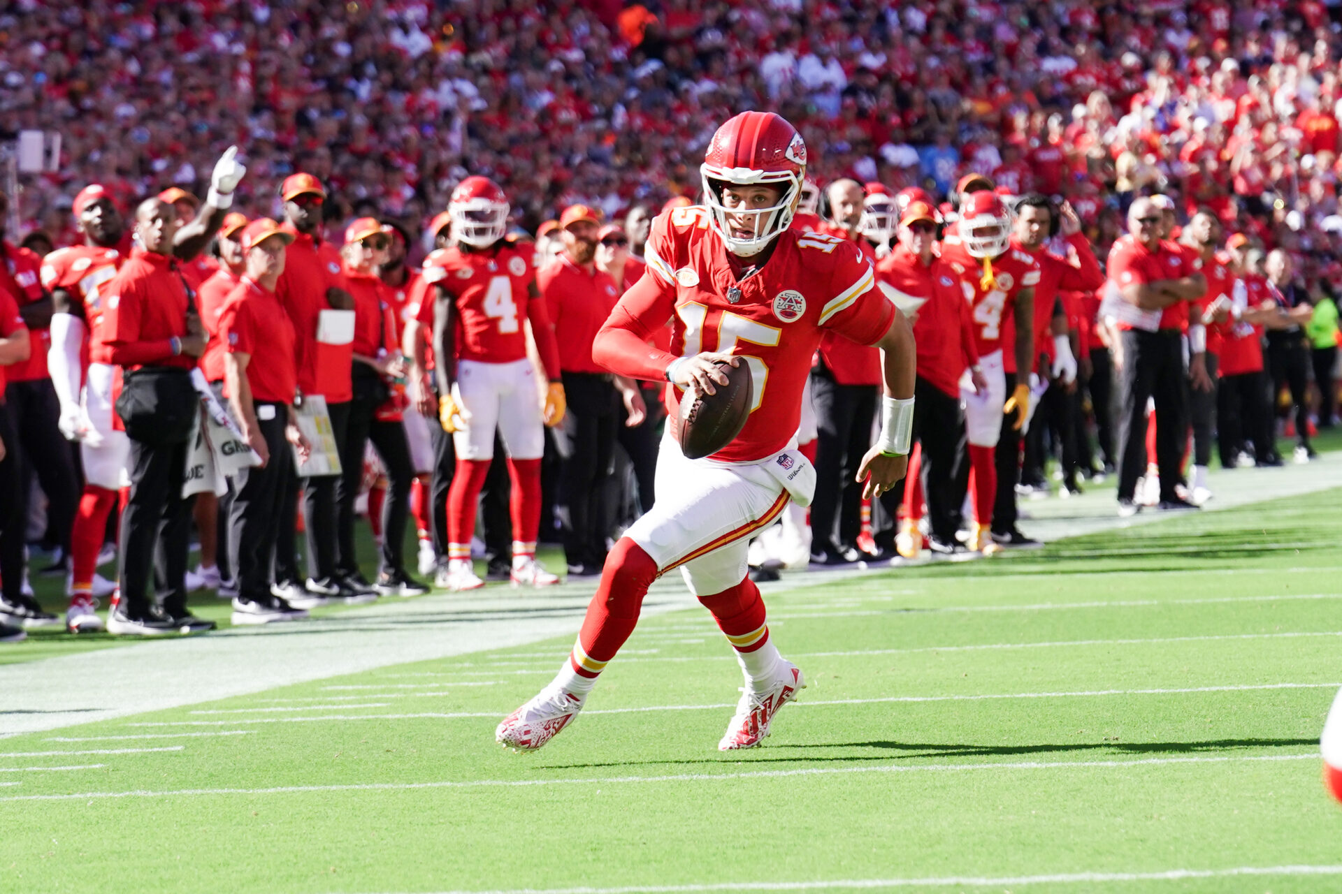 Patrick Mahomes running along the sideline