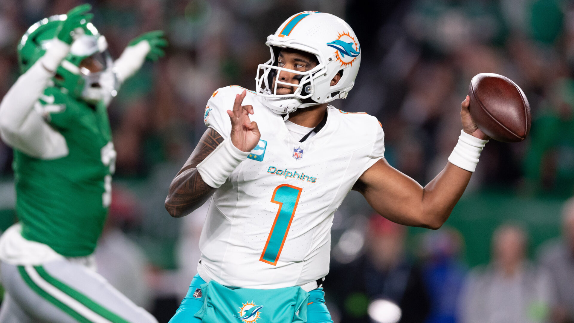 Oct 22, 2023; Philadelphia, Pennsylvania, USA; Miami Dolphins quarterback Tua Tagovailoa (1) passes the ball against the Philadelphia Eagles during the first quarter at Lincoln Financial Field. Mandatory Credit: Bill Streicher-USA TODAY Sports