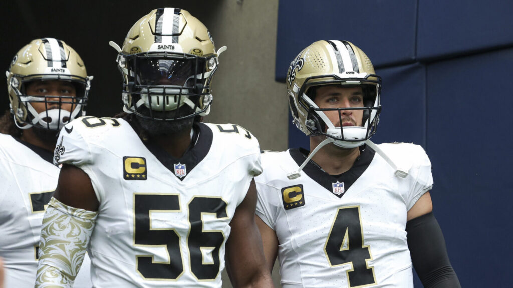 New Orleans Saints linebacker Demario Davis and quarterback Derek Carr