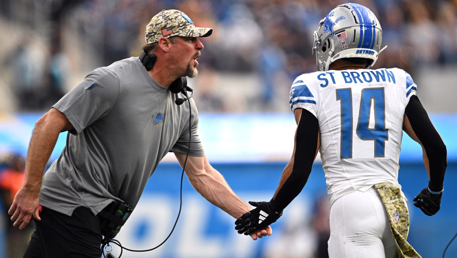 Detroit Lions coach Dan Campbell and receiver Amon-Ra St. Brown
