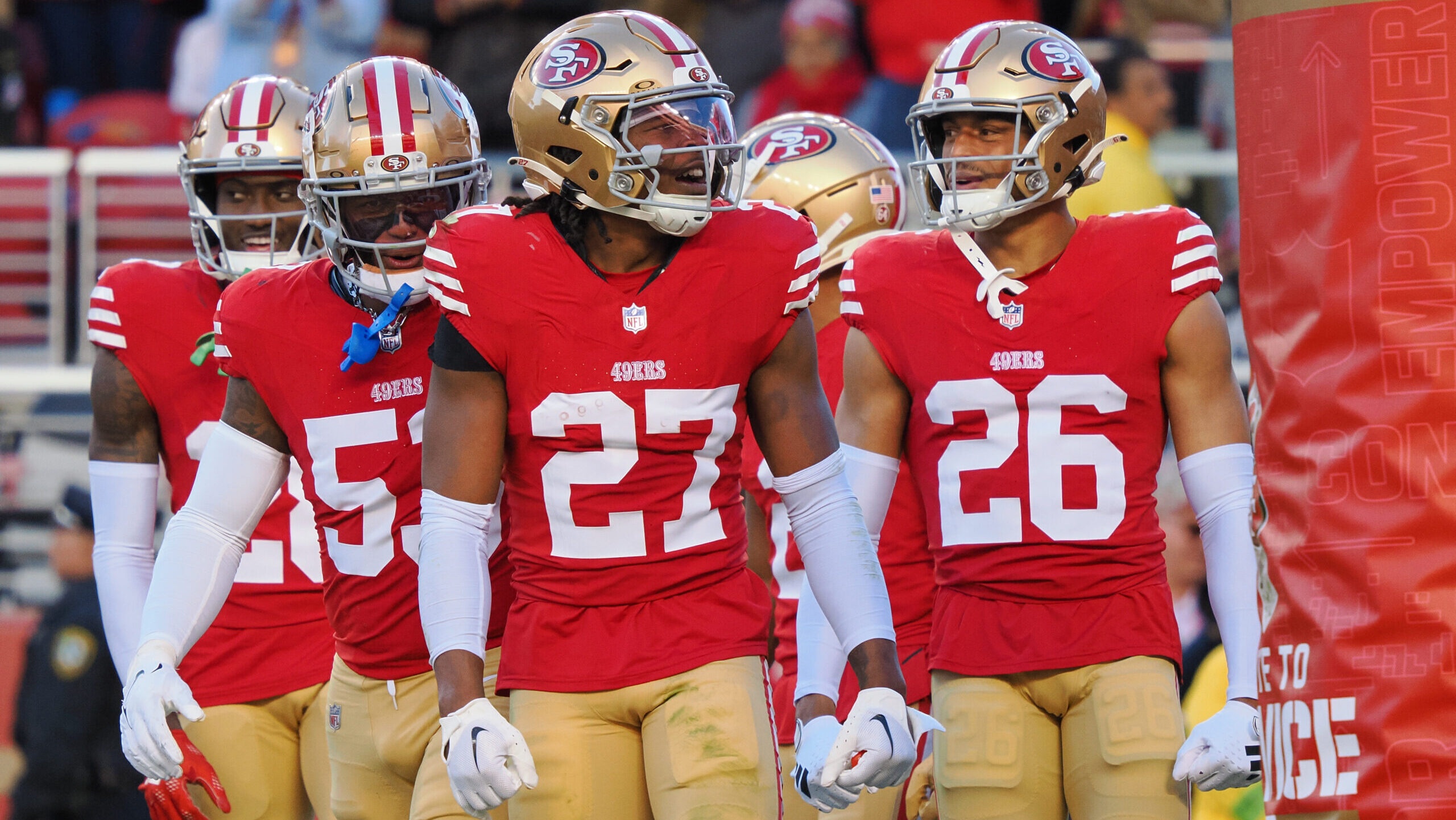 Ji'Ayir Brown celebrates with 49ers teammates