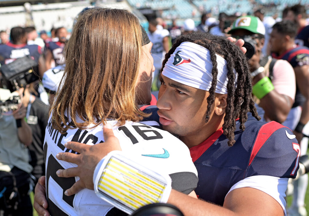 Cj.J. Stroud and Trevor Lawrence embrace post game.