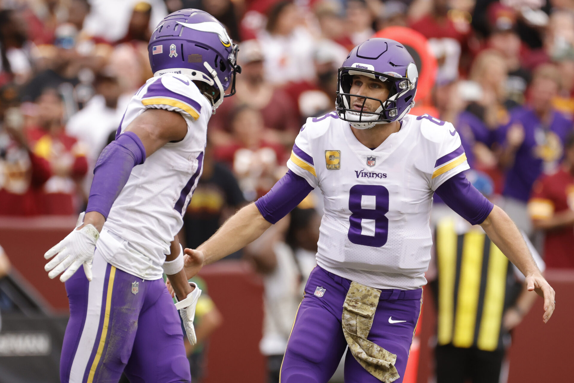 Kirk Cousins celebrates with Justin Jefferson