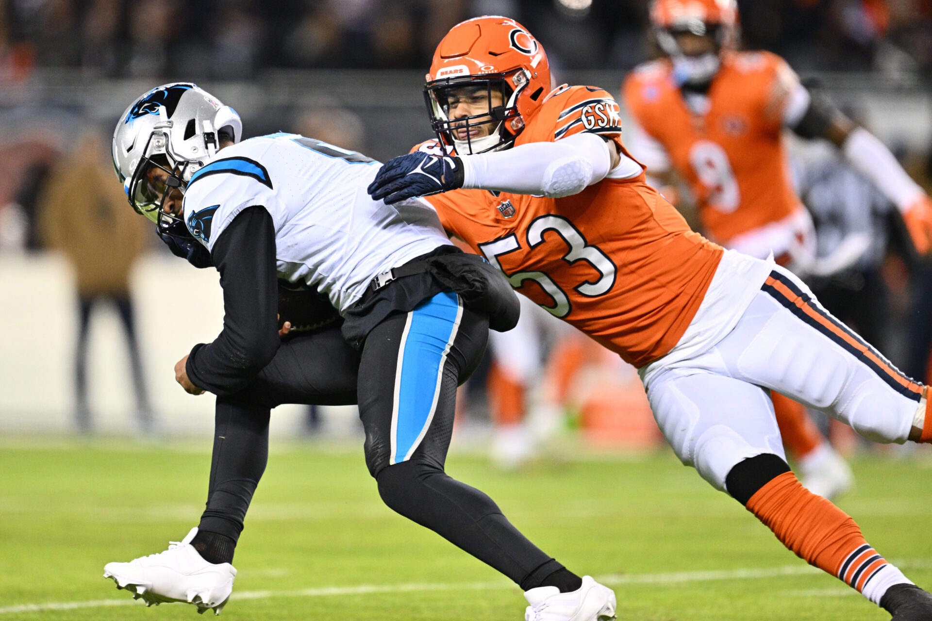 Bryce Young is tackled by a Chicago Bears player