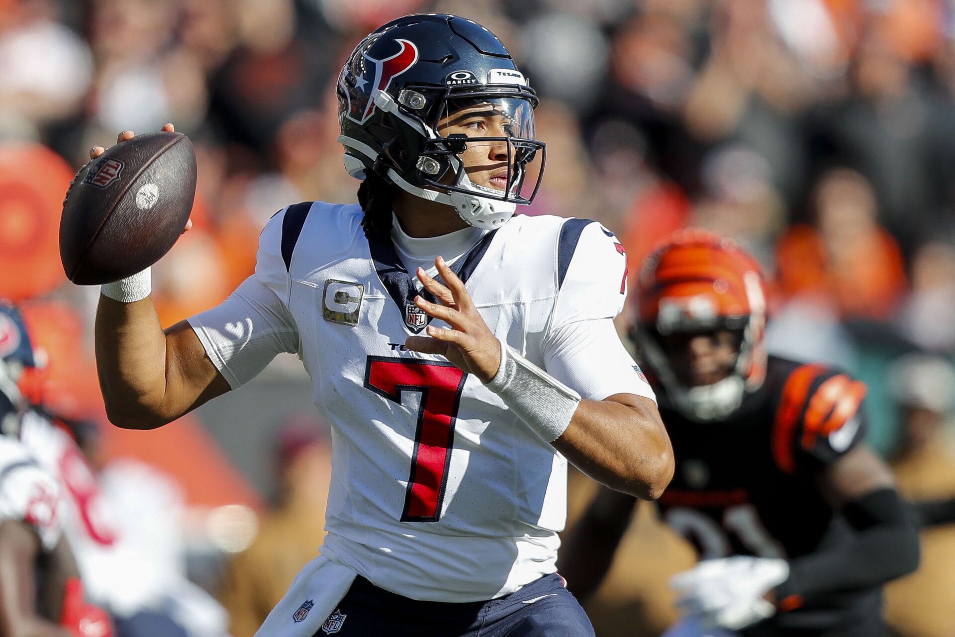 C.J. Stroud looks to pass in the pocket