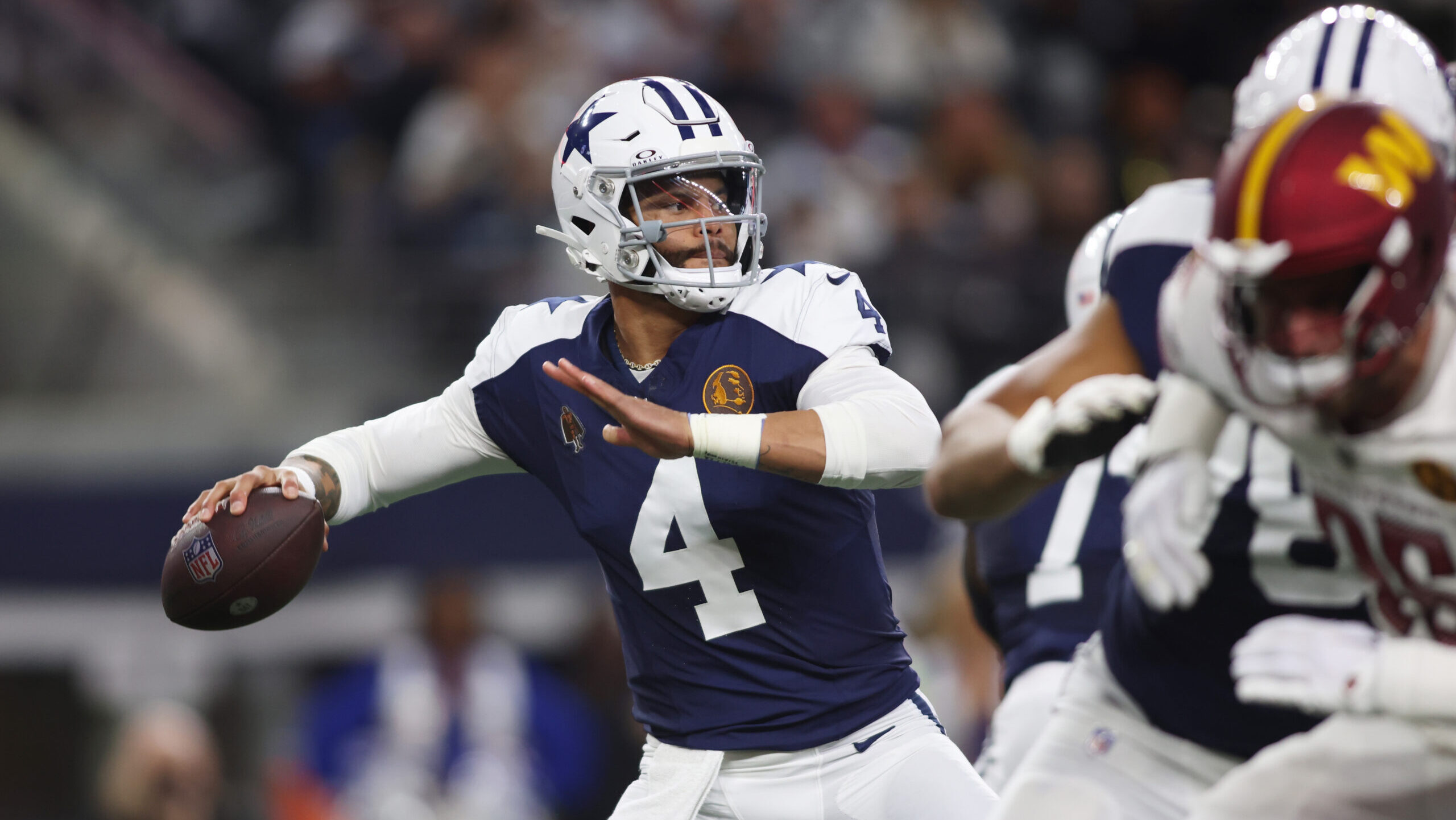 Dallas Cowboys QB Dak Prescott passes against the Washington Commanders