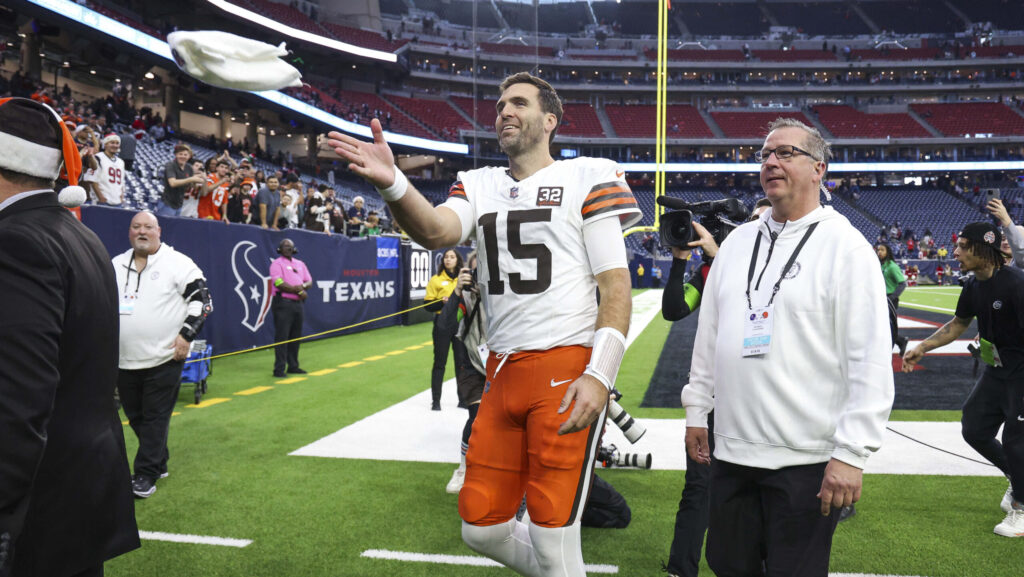 Joe Flacco walks off the field after beating Houston Texans