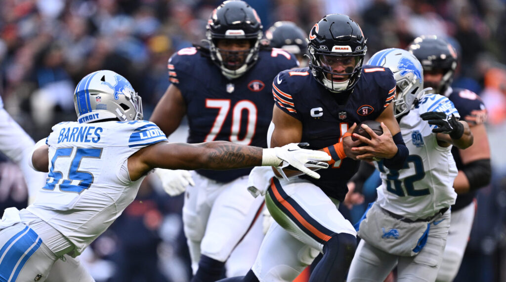 Detroit Lions linebacker Derrick Barns tries to tackle Chicago Bears quarterback Justin Fields