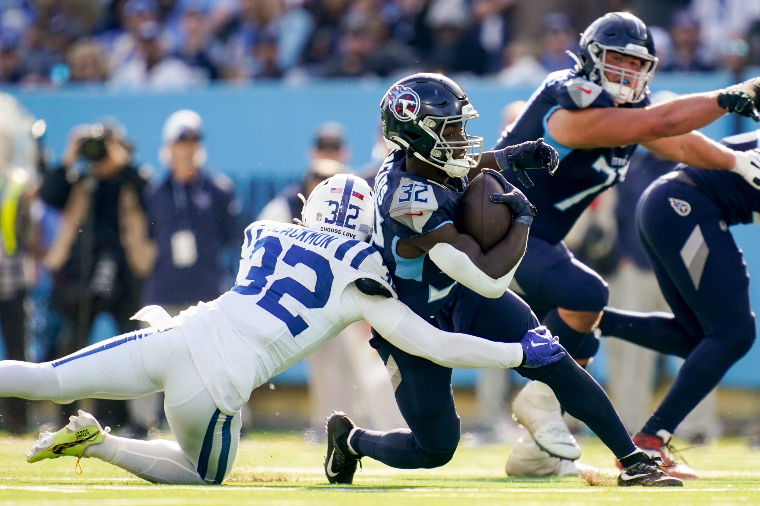 Tyjae Spears breaks a tackle vs. Colts