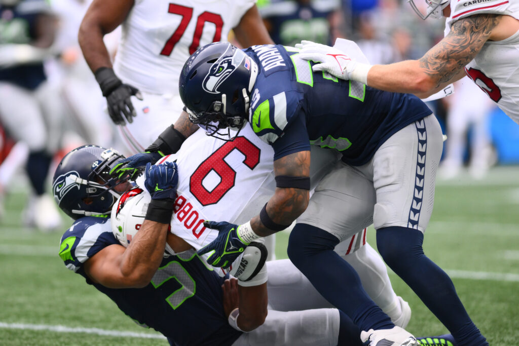 Bobby Wagner and Jamal Adams tackle the Cardinals' quarterback