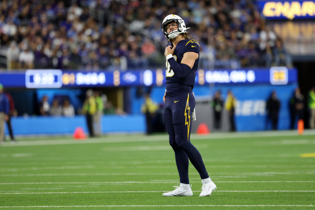 Justin Herbert stands alone on the field