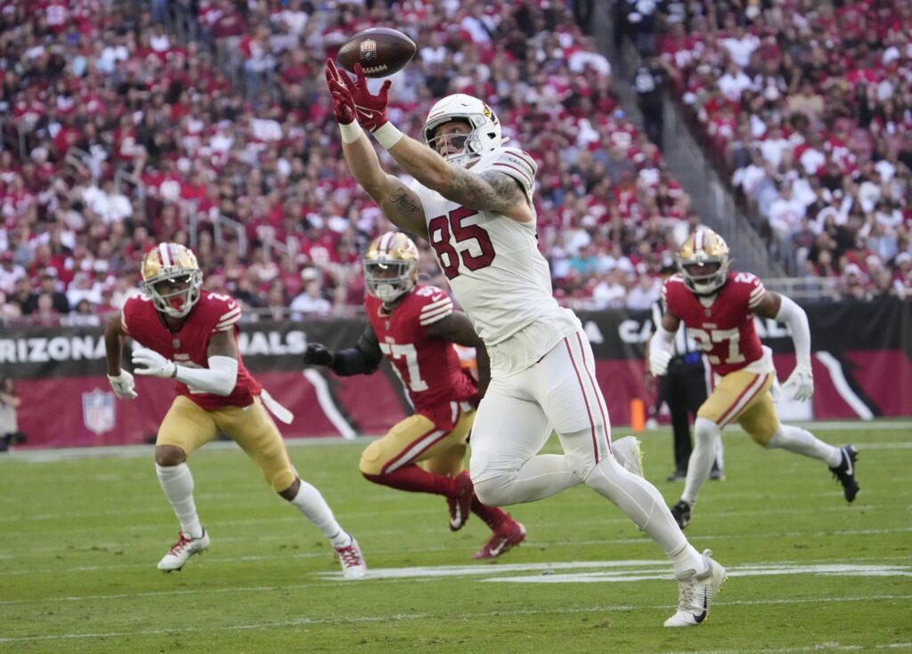 Trey McBride stretching out to catch a pass