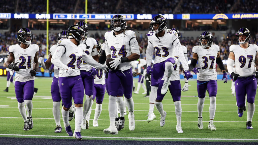 Baltimore Ravens linebacker Jadeveon Clowney (24) celebrates with his teammates after recovering a fumble.