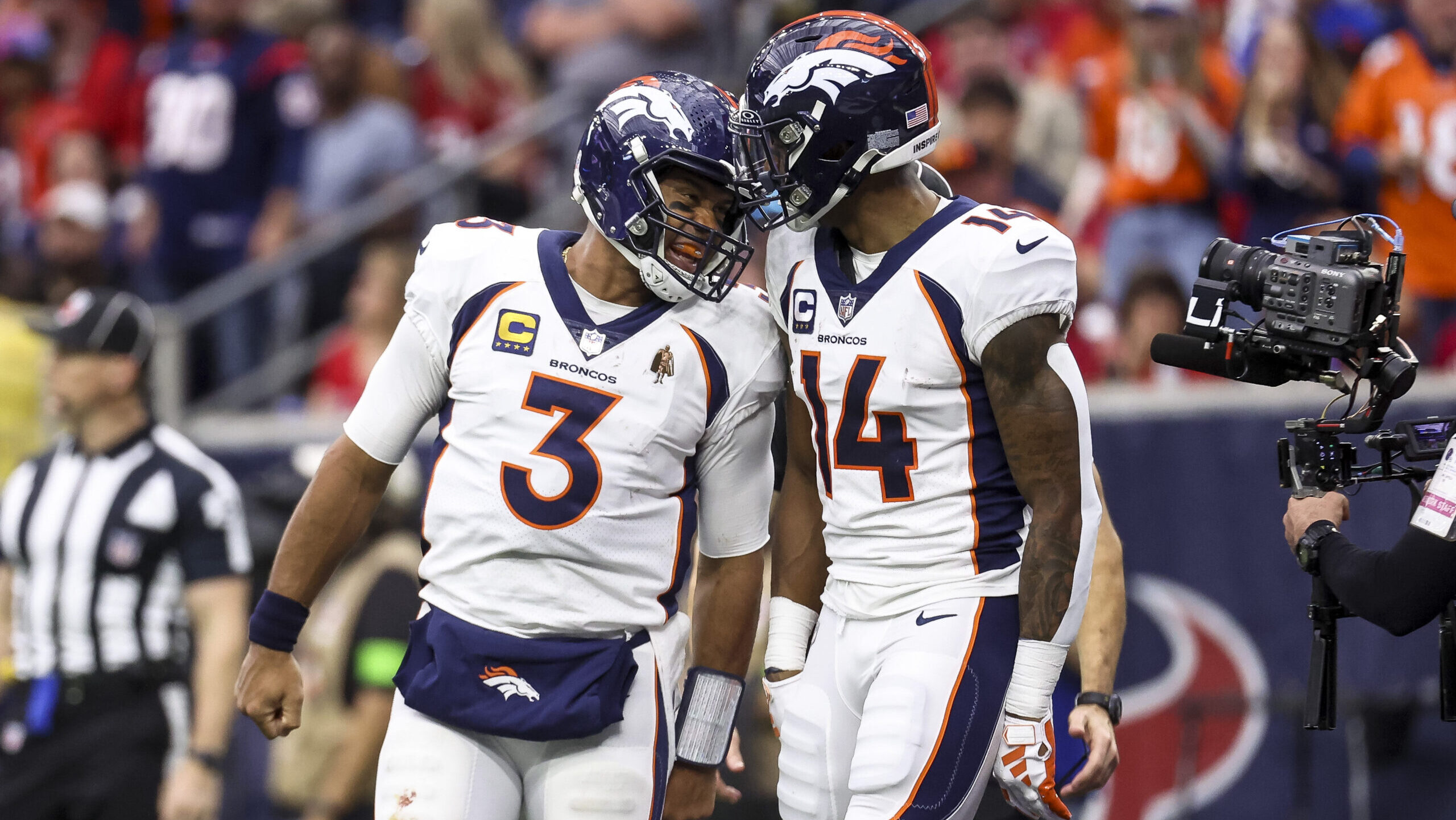 Denver Broncos quarterback Russell Wilson, left, and wide receiver Courtland Sutton