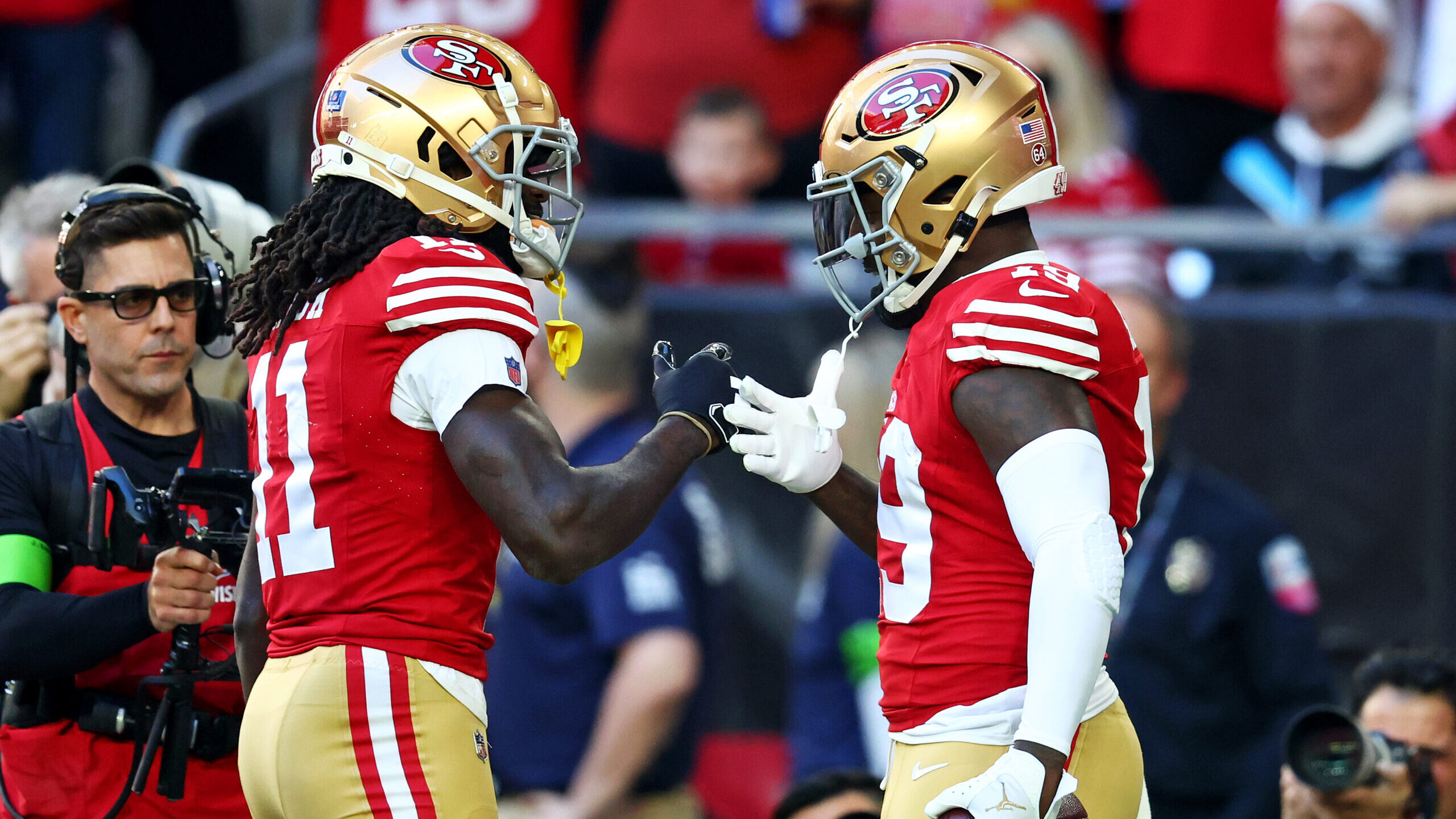 San Francisco 49ers wide receivers Brandon Aiyuk, left, and Deebo Samuel