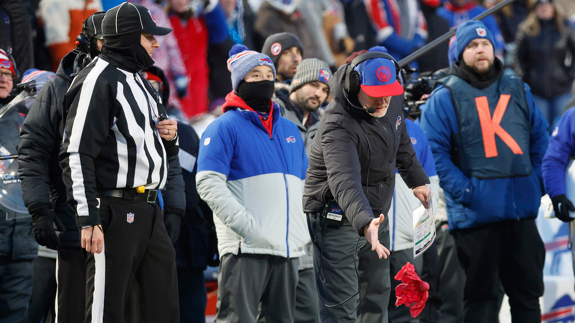 Sean McDermott throws a red challenge flag