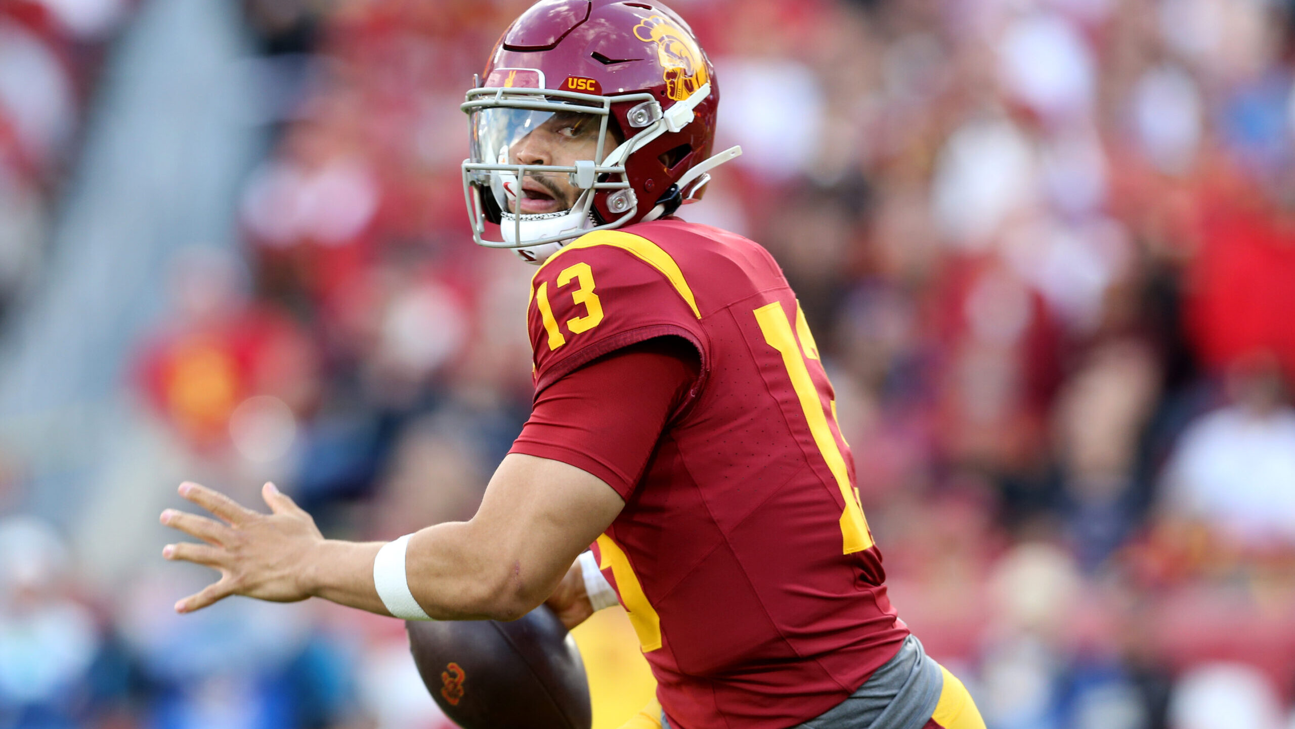 Caleb Williams prepares to throw the ball