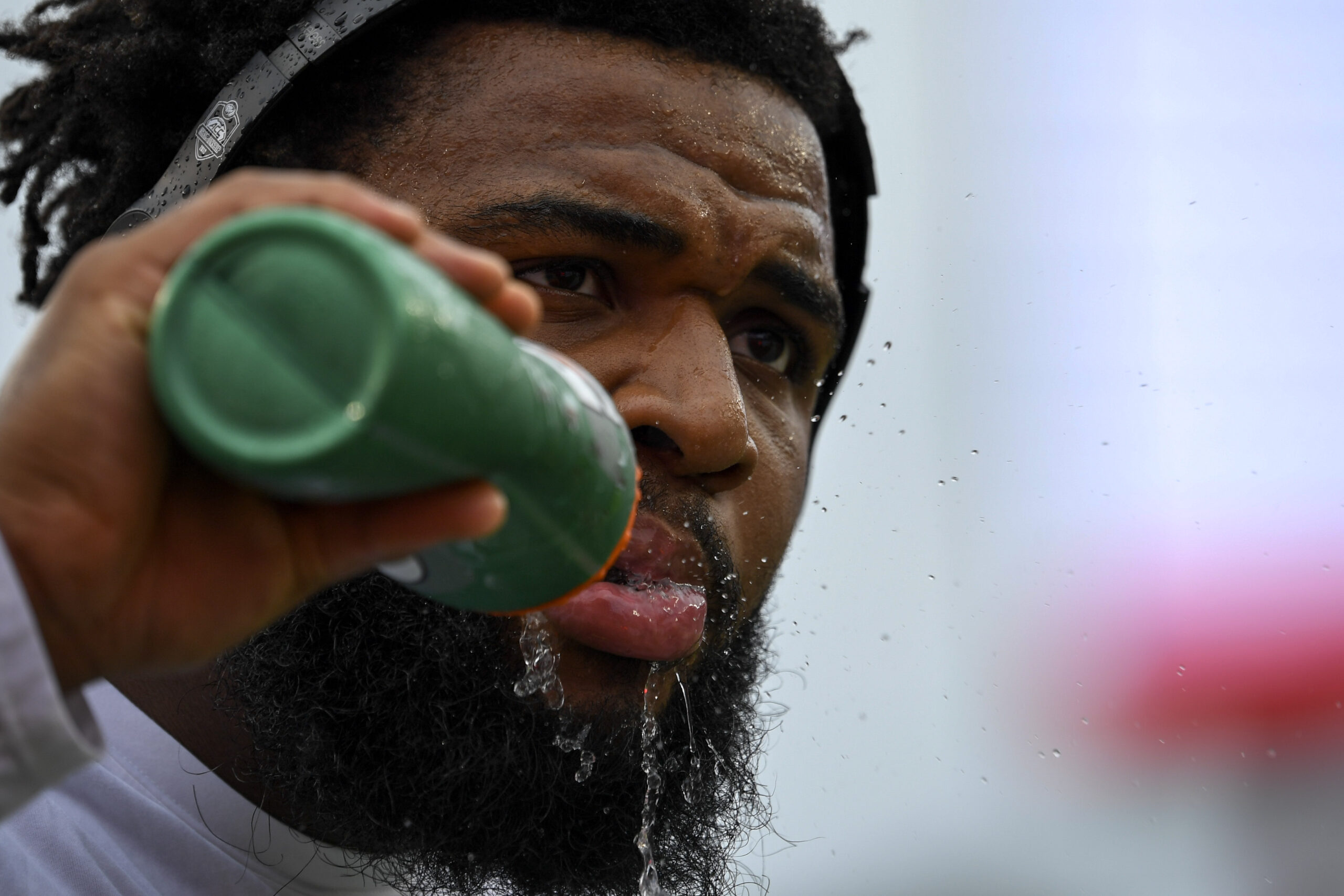 Christian Wilkins drinks water