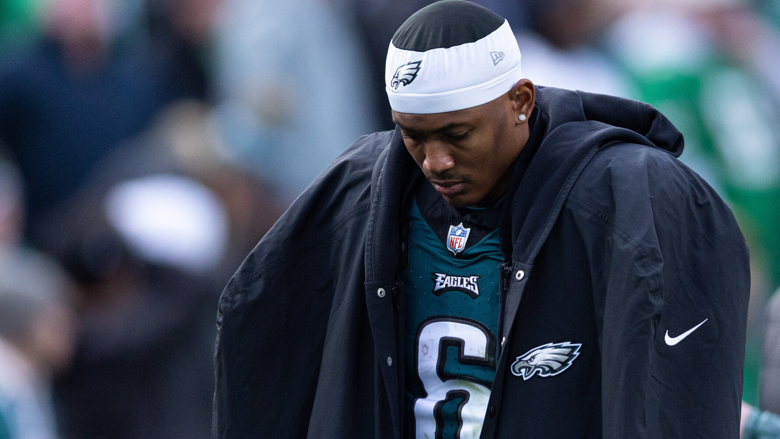 DeVonta Smith walks with his head down after Eagles loss.