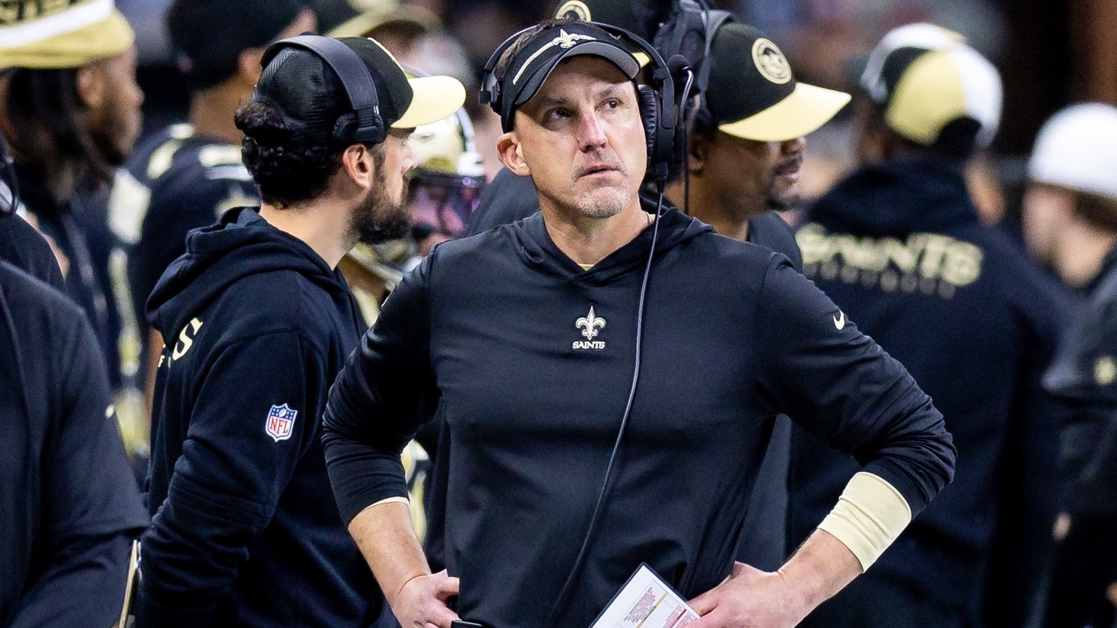 Dennis Allen stands on Saints sideline