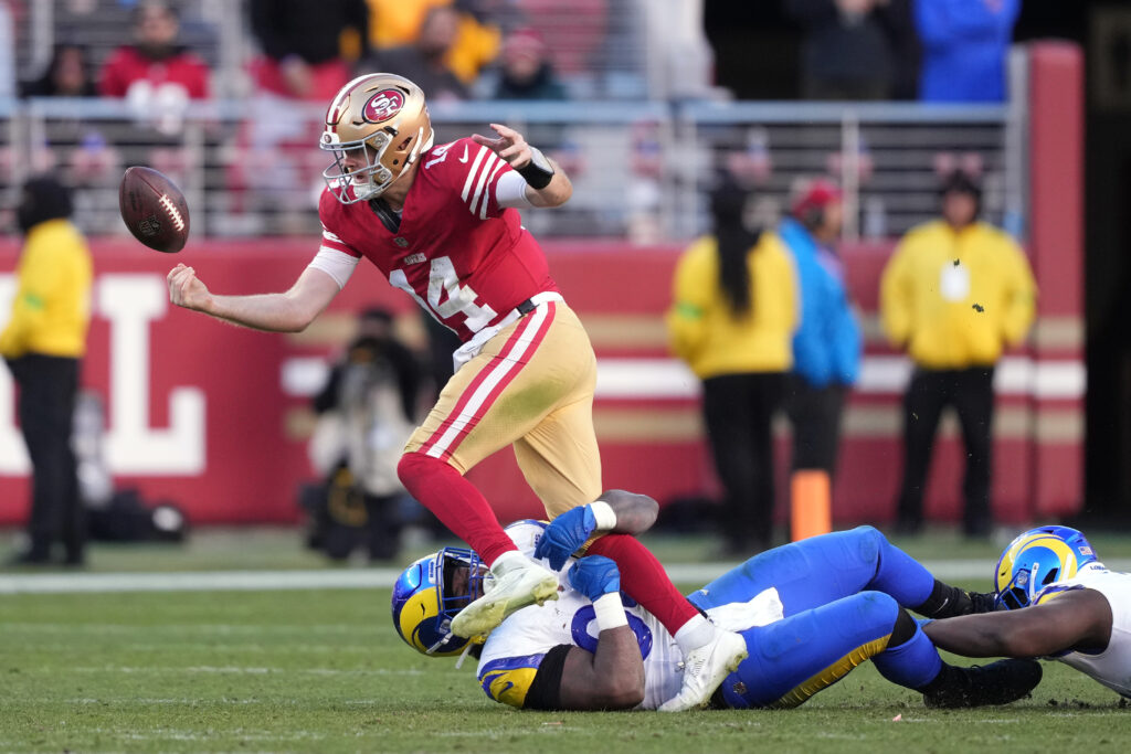 Sam Darnold breaks a tackle vs. Los Angeles Rams