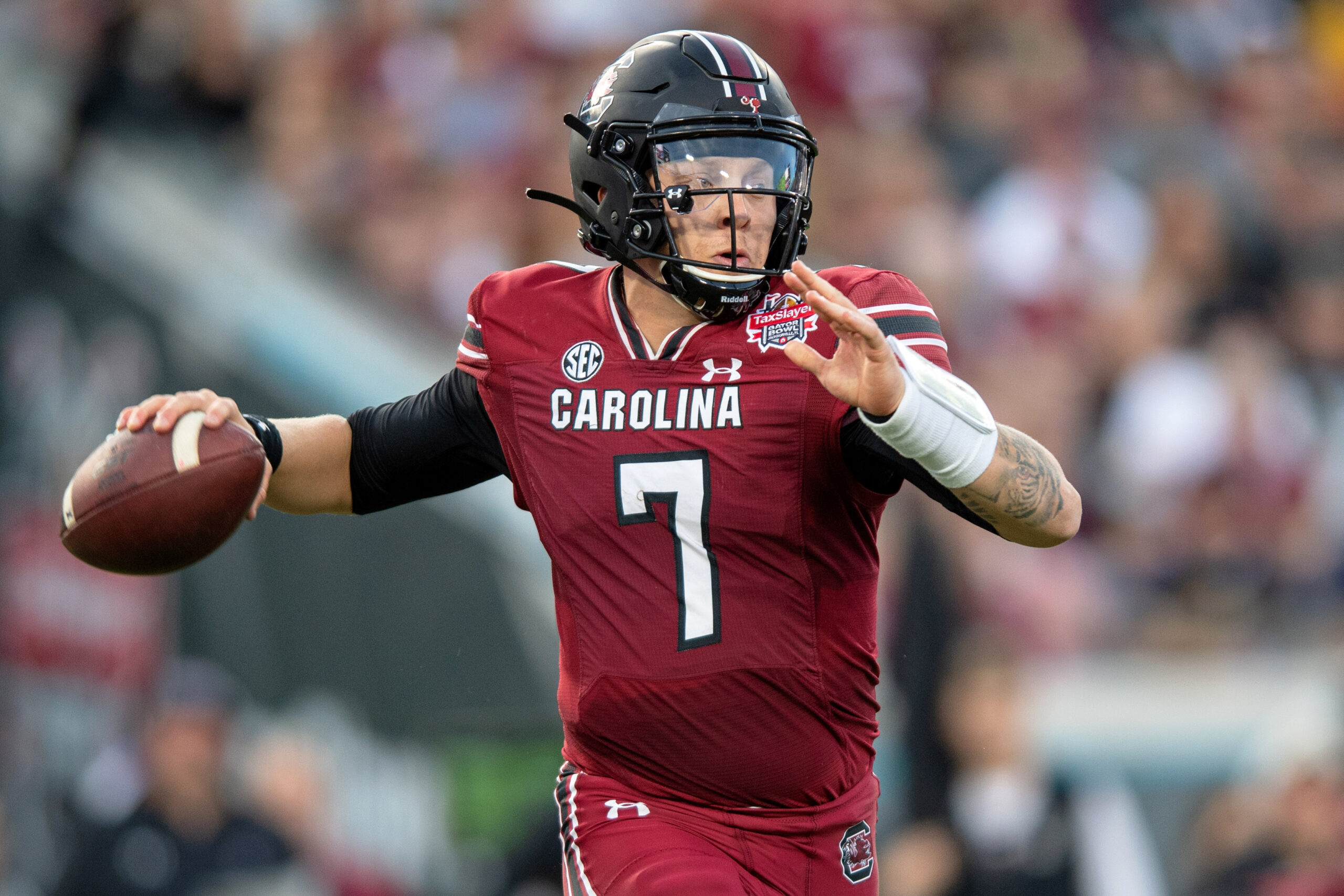 South Carolina QB Spencer Rattler reaches back to throw pass