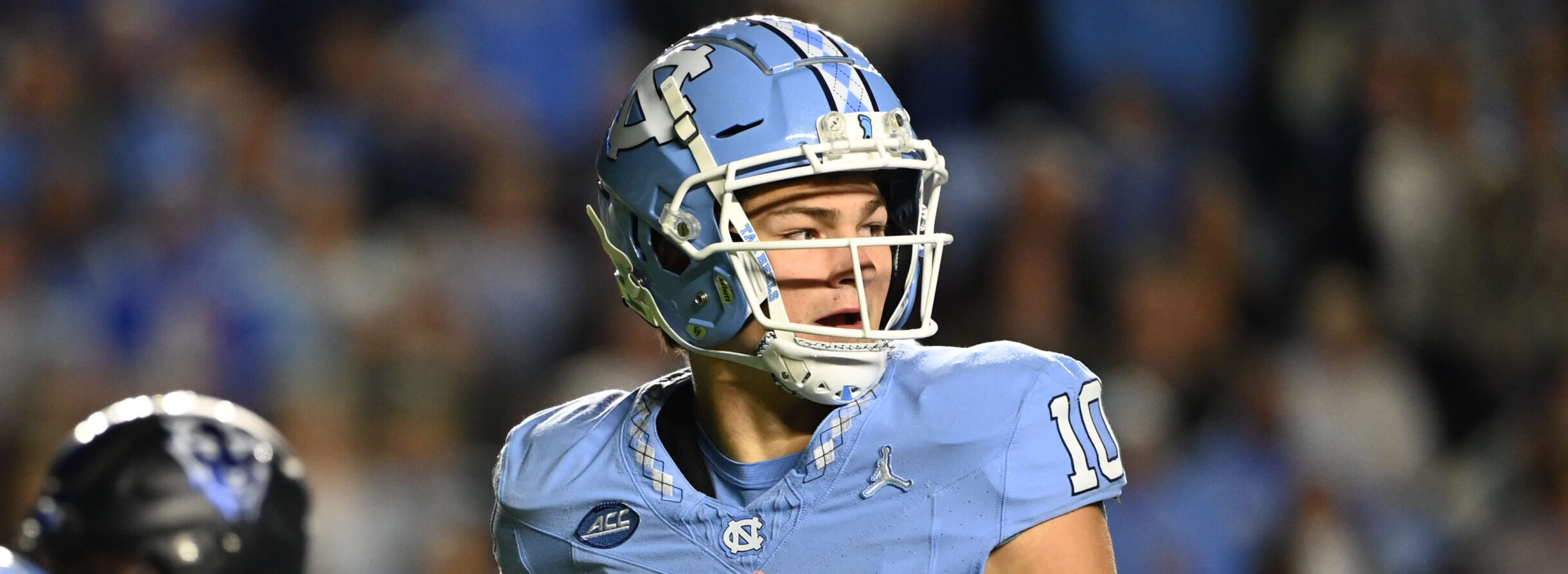 Drake Maye looks to throw