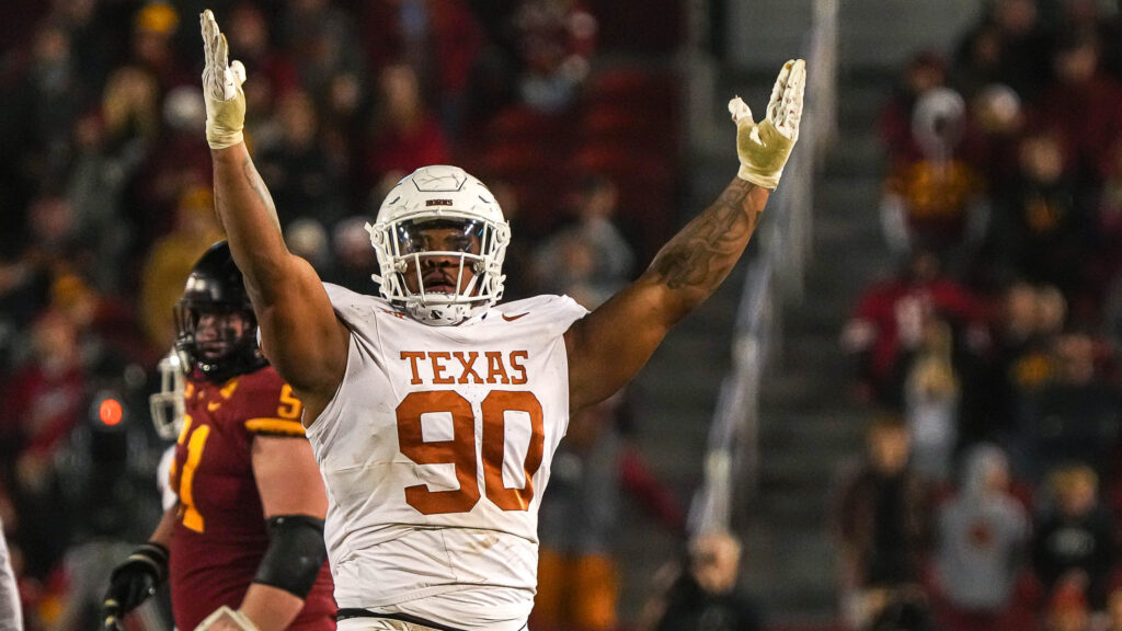 Texas defensive tackle Byron Murphy II celebrates a sack