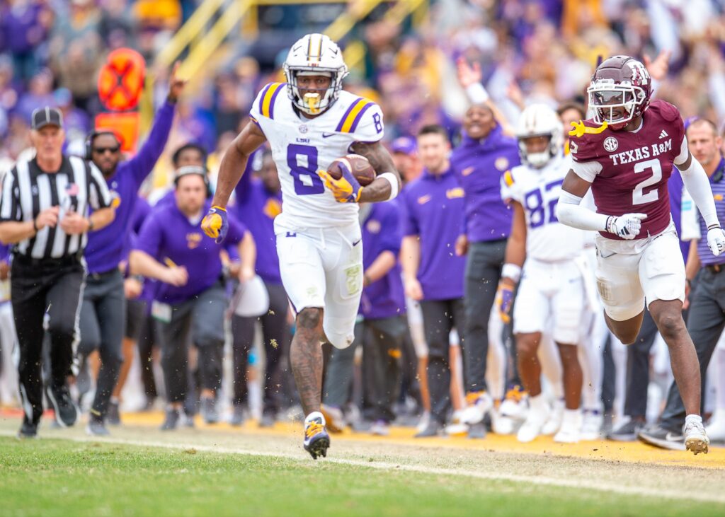 Malik Nabers runs along the sideline