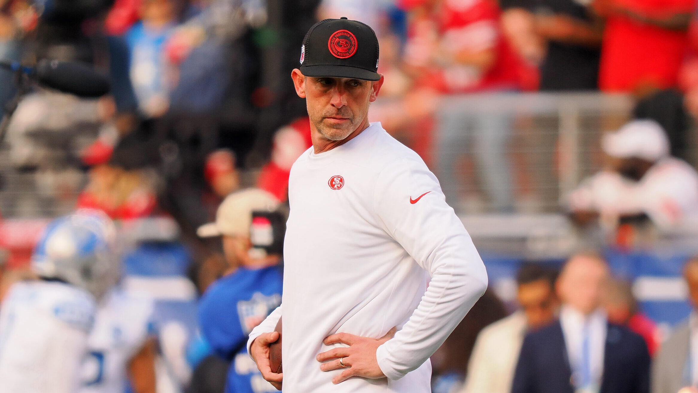 49ers head coach Kyle Shanahan stands on the field before NFC Championship