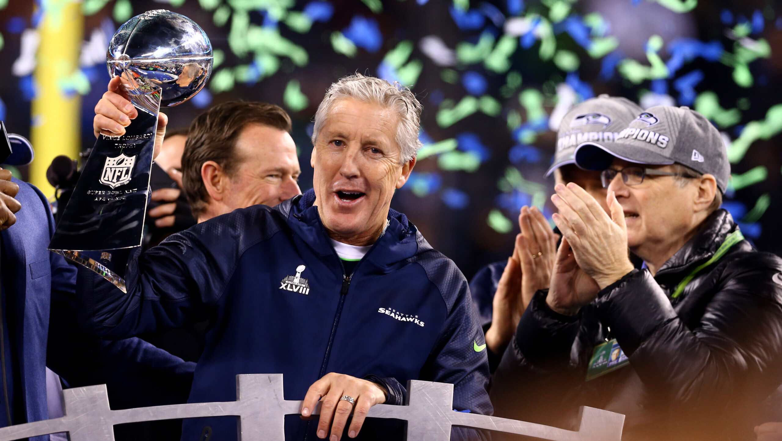 Seattle Seahawks head coach Pete Carroll hoists the Vince Lombardi Trophy
