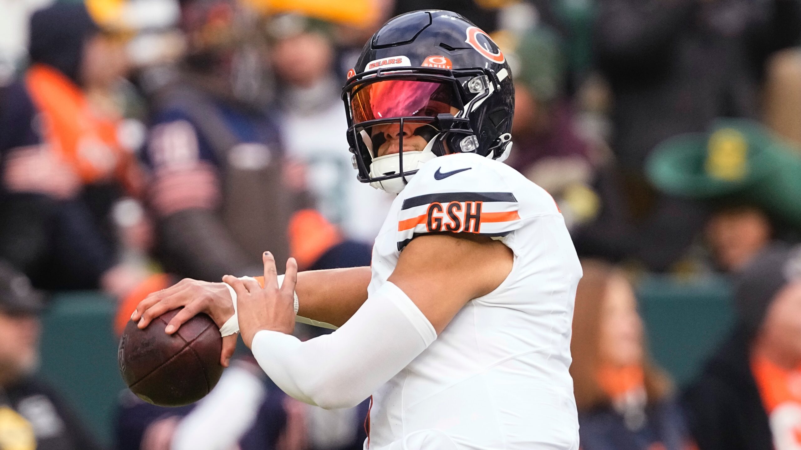 Chicago Bears QB Justin Fields throws the ball