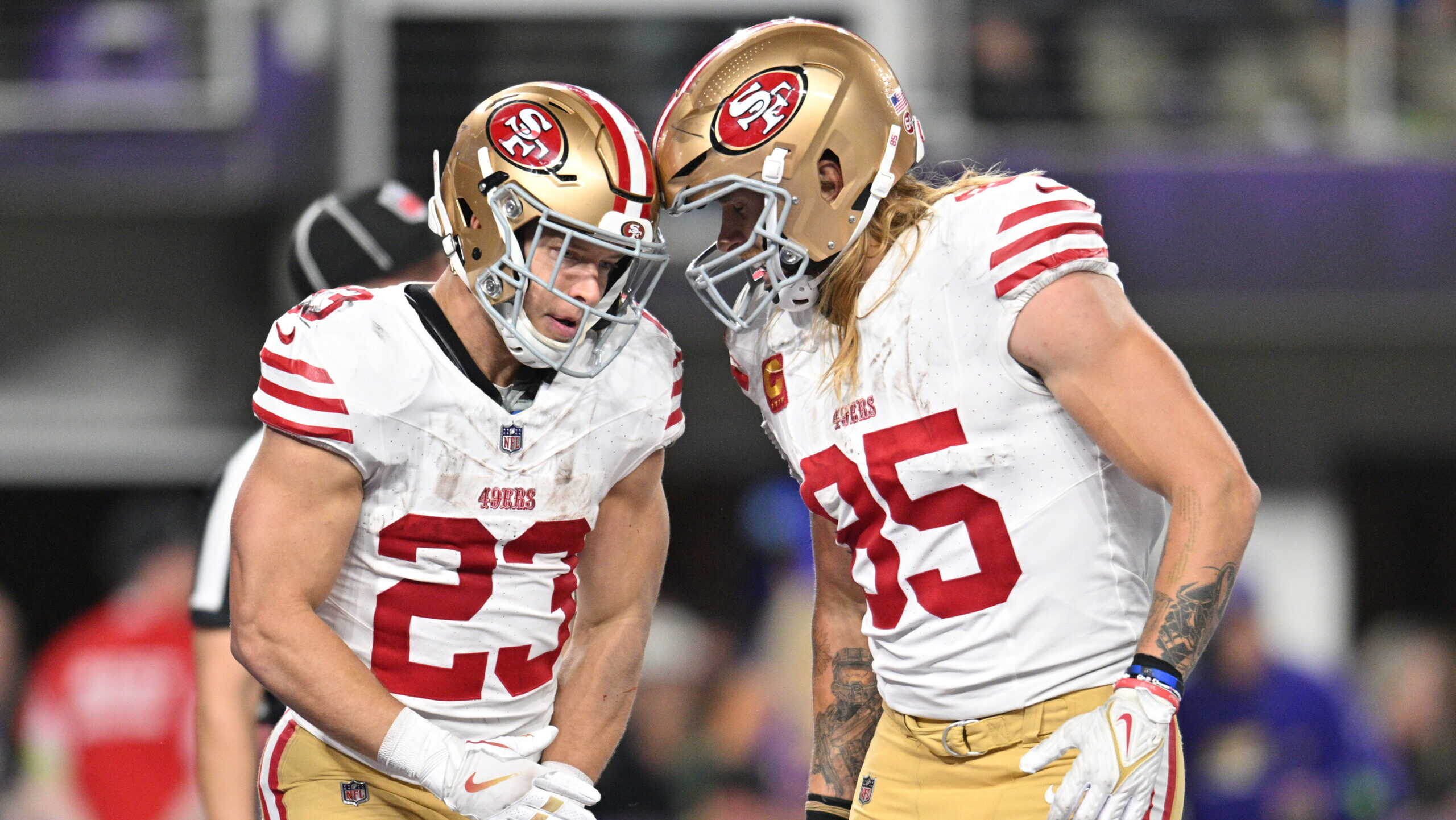 San Francisco 49ers running back Christian McCaffrey, left, and tight end George Kittle
