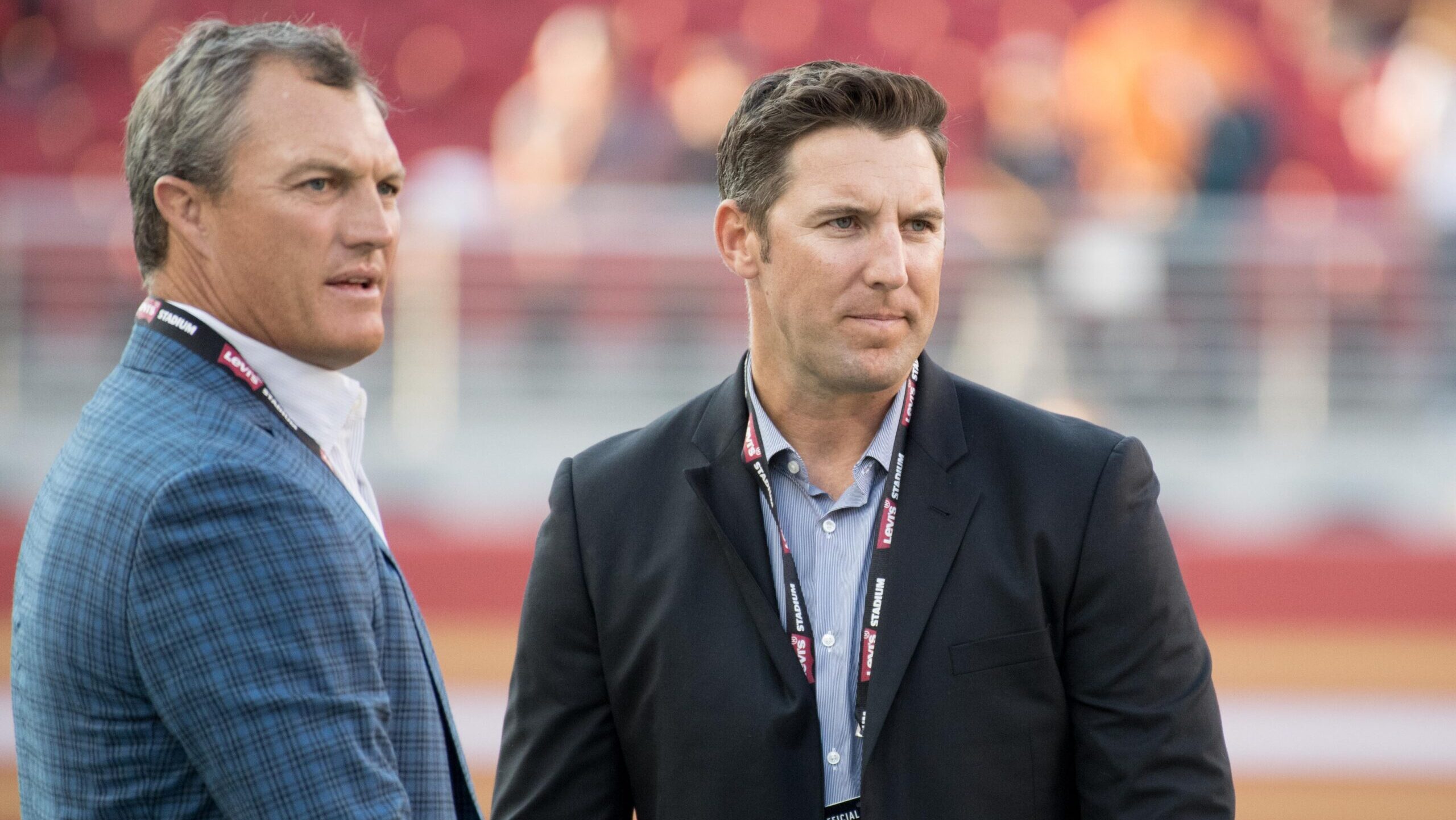 San Francisco 49ers general manager John Lynch, left, and assistant GM Adam Peters