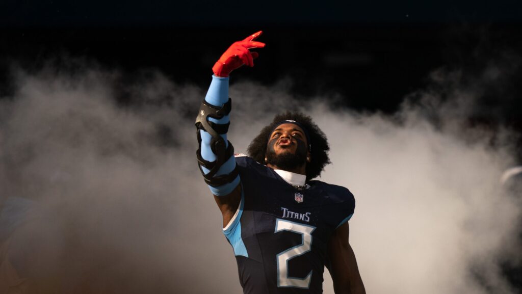 Azeez Al-Shaair runs out of the tunnel at Tennessee Titans satdium