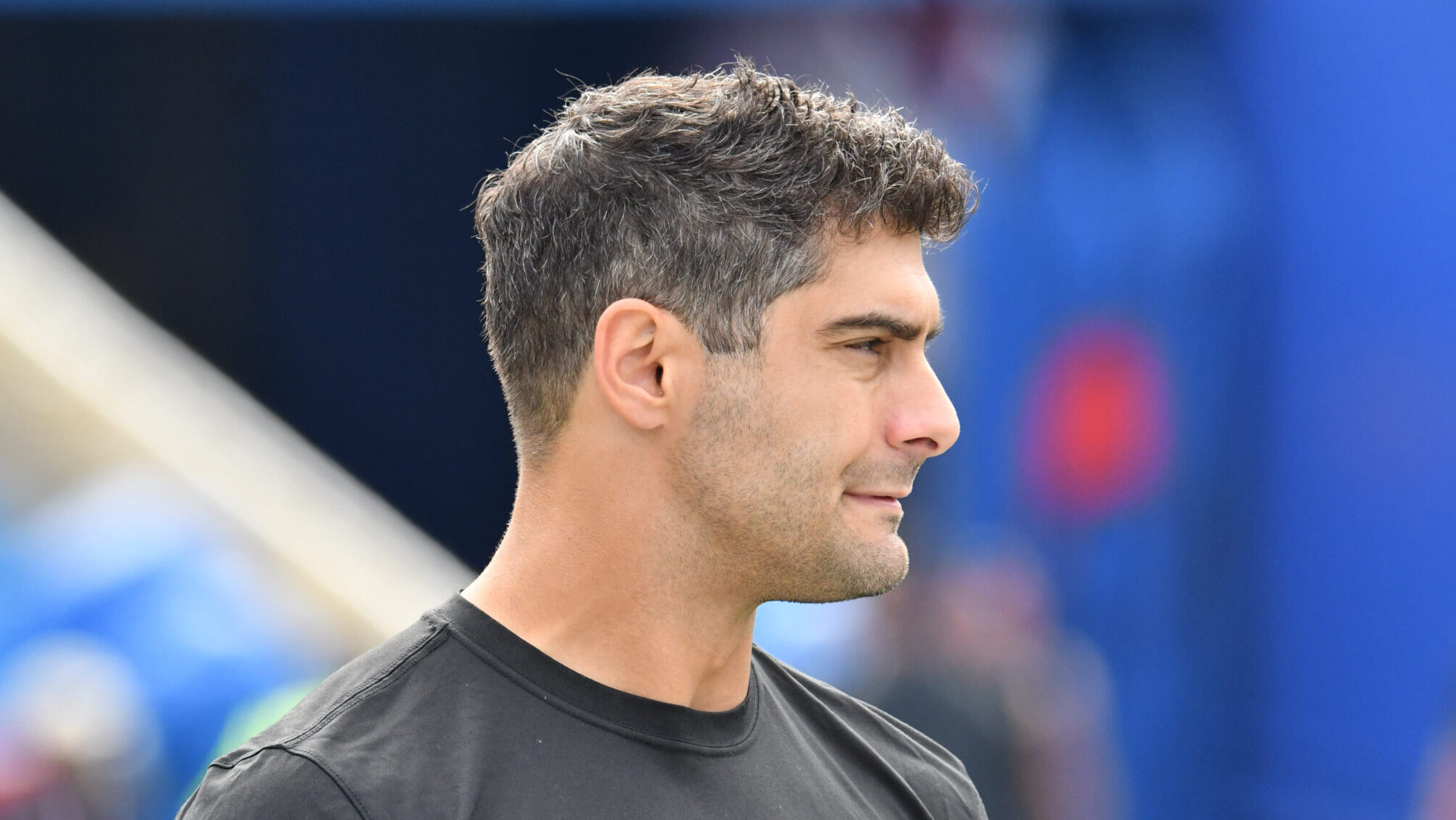 Jimmy Garoppolo looks with his helmet off