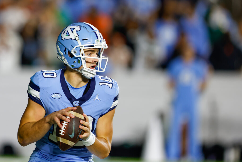 Close-up, upper body image of Drake Maye with a blurred background