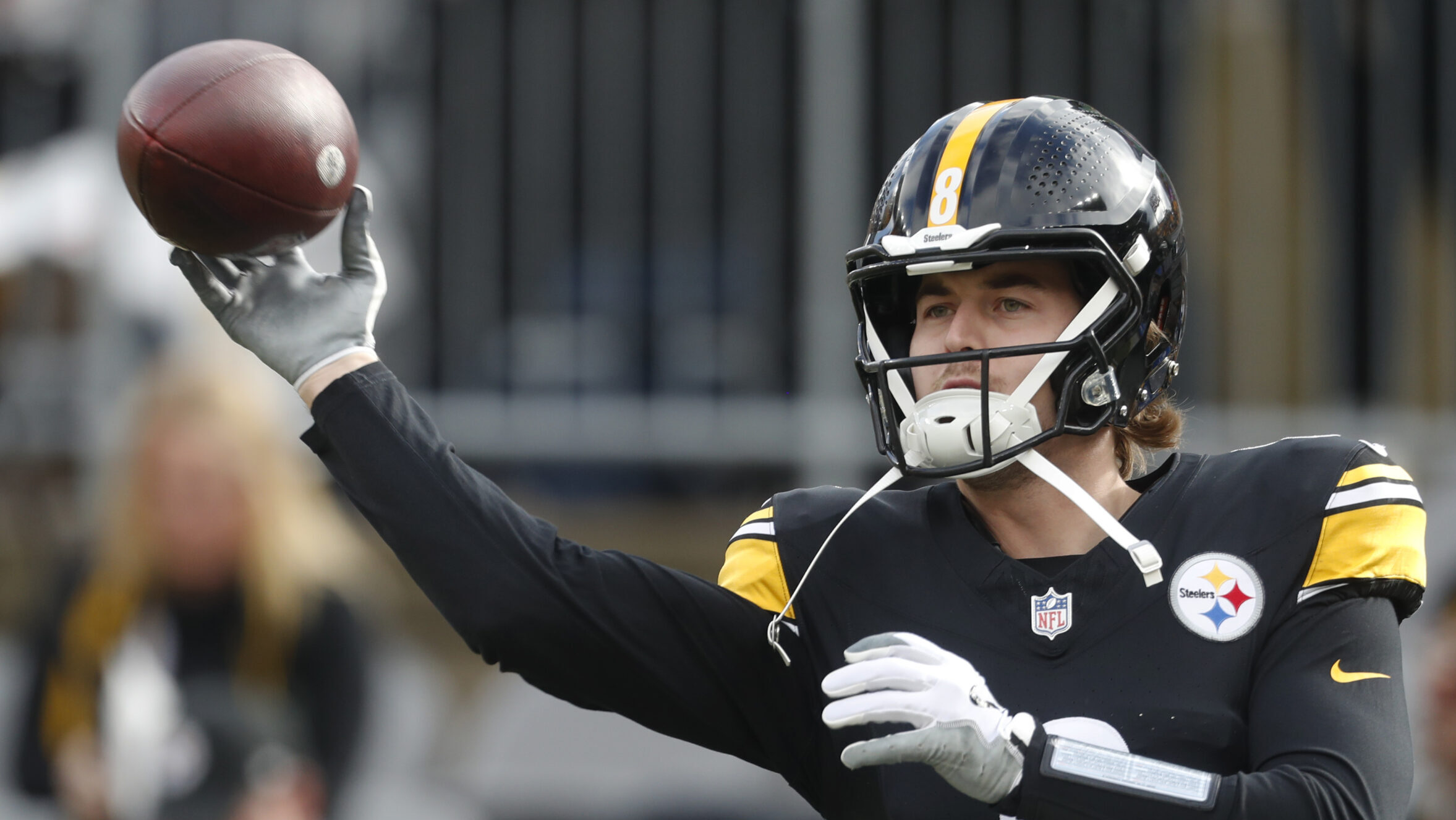 Steelers QB Kenny Pickett throws a pass before the game
