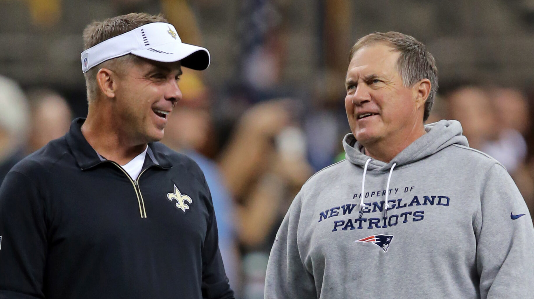 Sean Payton stands with Bill Belichick before a game in 2015