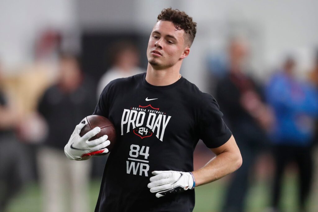 Ladd McConkey jogs to the sideline at the University of Georgia's Pro Day